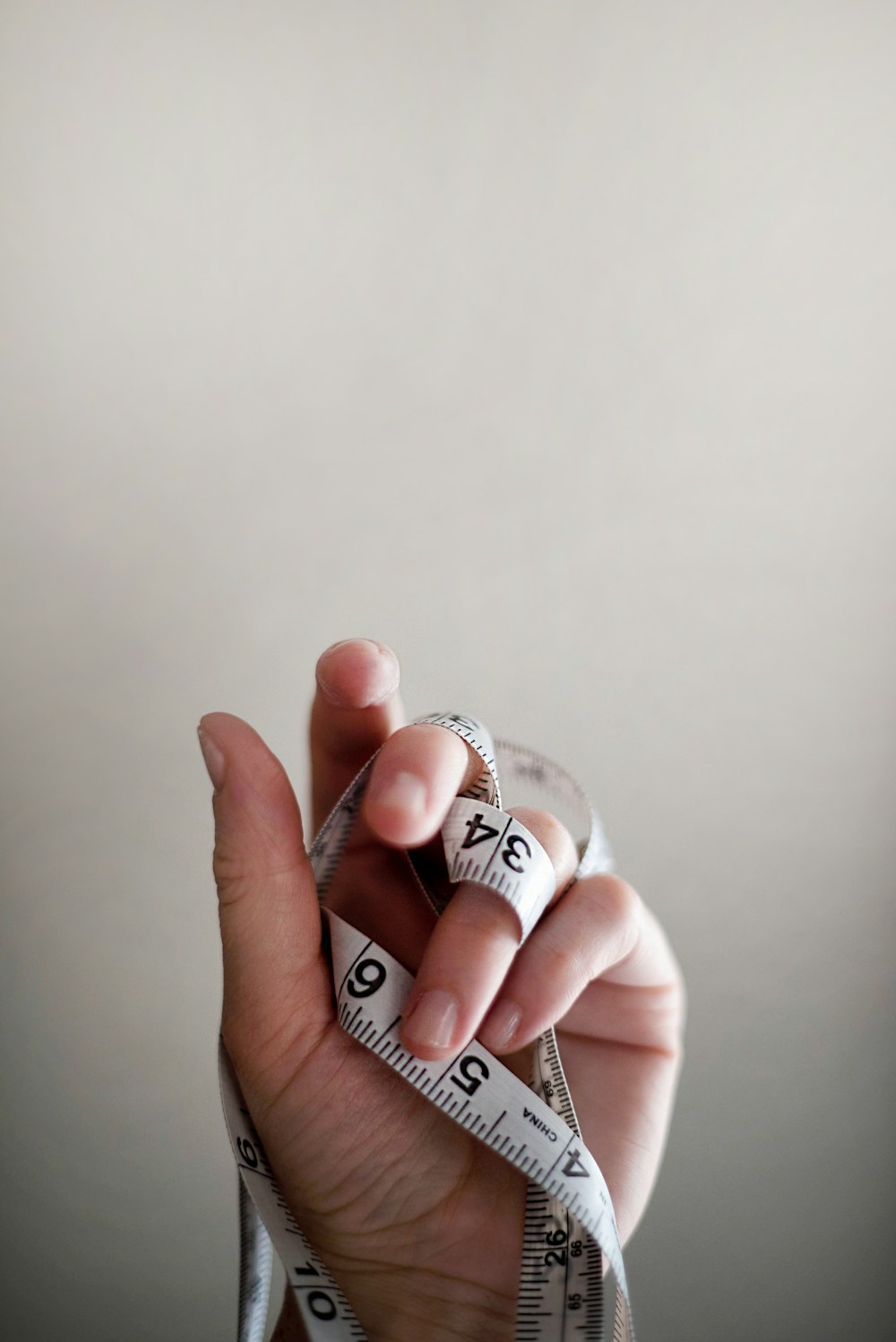 Measuring tape symbolizing weight management